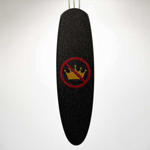 No Kings Cordsmith. A gold crown on a black handle in a red circle with a slash design.