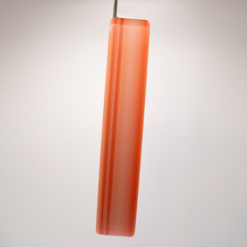 Peach Please Cordsmith featuring a filament that shifts from soft peach to coral. Because the filament is a gradient, no two handles are exactly alike.