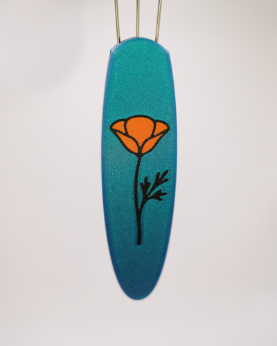 A stylized California poppy in orange and black on a teal handle